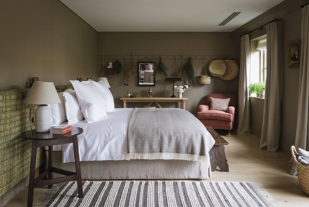 Image may contain Indoors Room Bedroom Rug Furniture and Bed