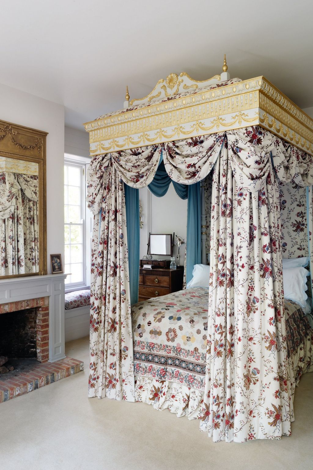 Image may contain Indoors Room Bedroom Home Decor Furniture Interior Design Bed and Fireplace