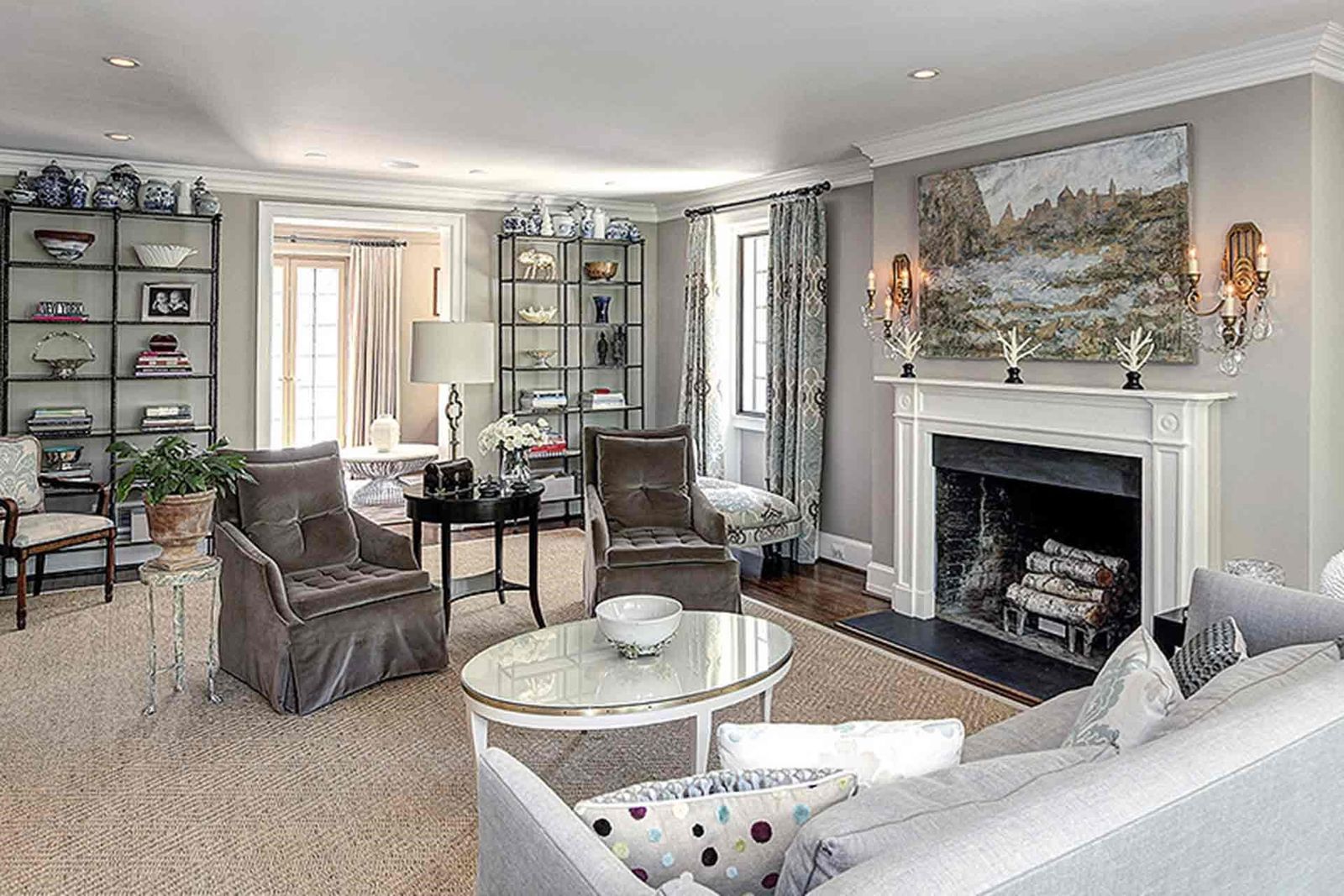 Image may contain Furniture Chair Living Room Room Indoors Table Coffee Table Couch Rug and Lobby