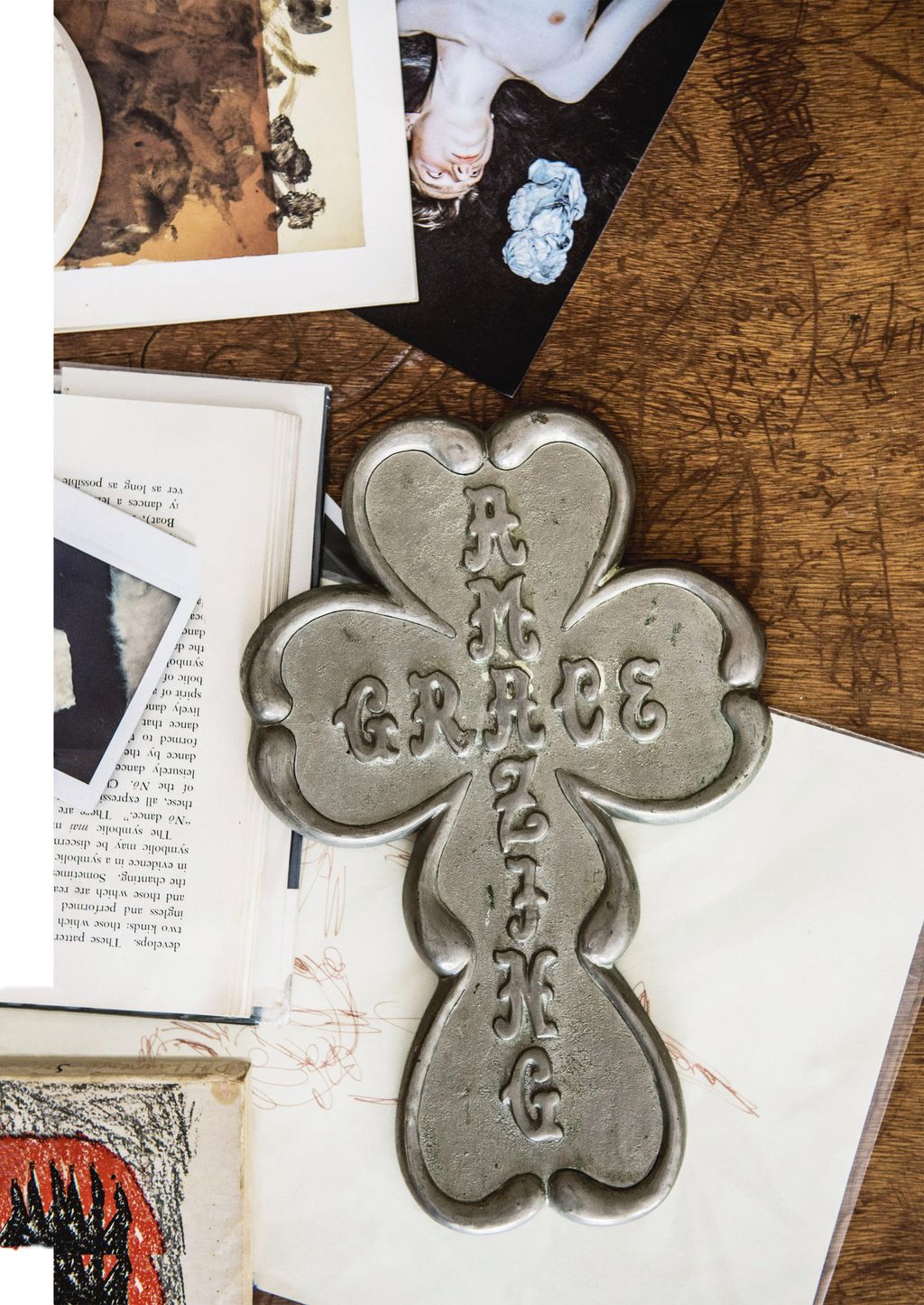 Image may contain Cross and Symbol