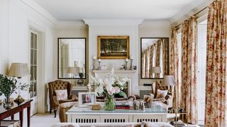 Image may contain Living Room Room Indoors Furniture Couch Interior Design Cushion Table Pillow and Plant