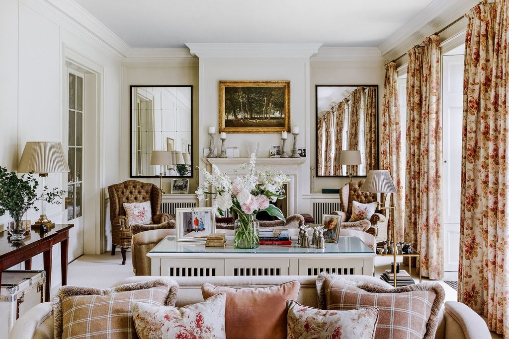 Image may contain Living Room Room Indoors Furniture Couch Interior Design Cushion Table Pillow and Plant