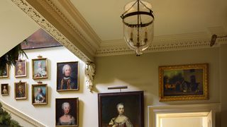 Image may contain Banister Handrail Flooring Human Person Floor Staircase Interior Design and Indoors