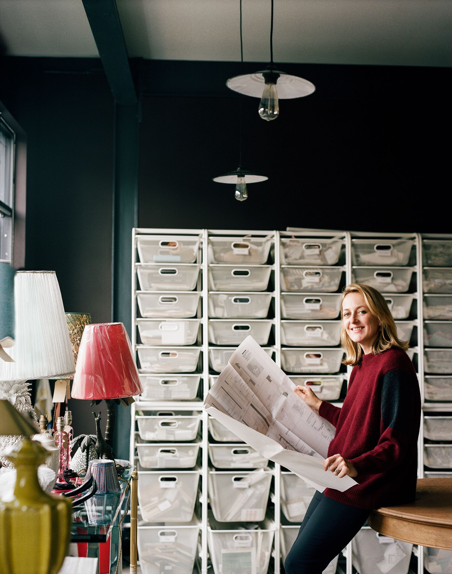 Image may contain Human Person Furniture Lamp and Table Lamp