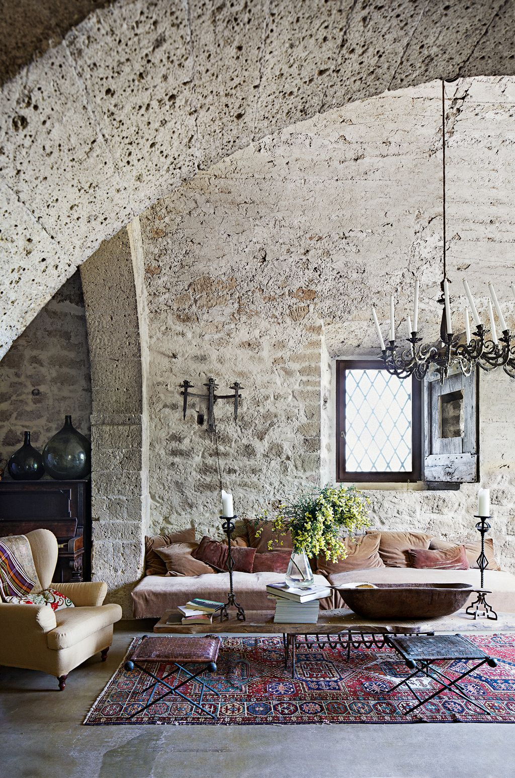 Image may contain Furniture Living Room Indoors Room Rug Table Coffee Table Interior Design and Couch