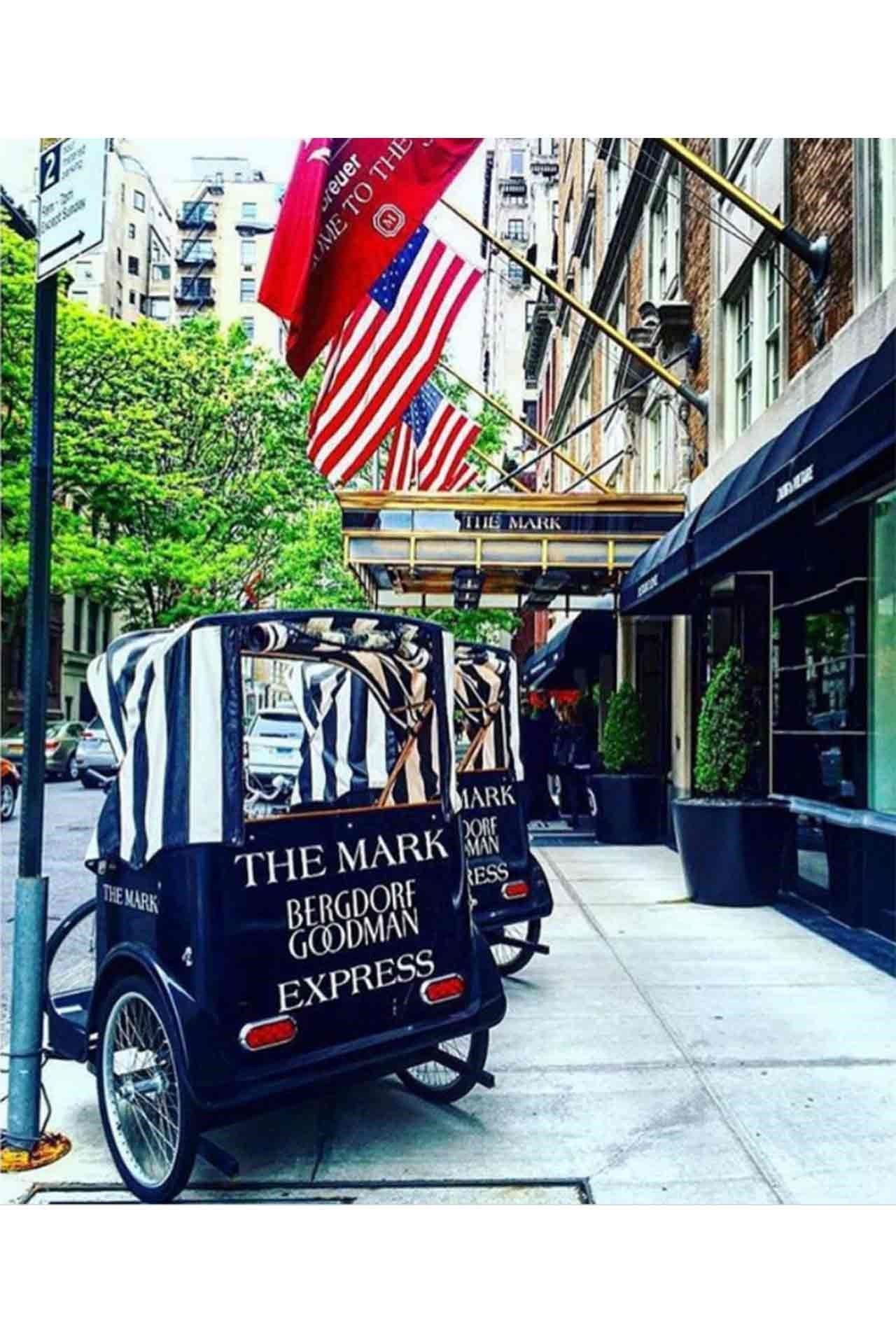 Image may contain Human Person Wheel Machine Flag Symbol Vehicle Transportation Automobile and Car