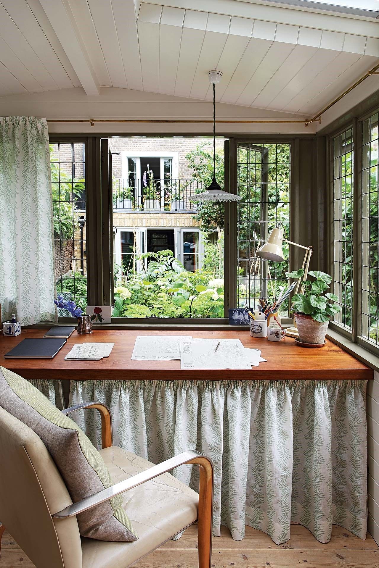 Image may contain Furniture Chair Wood Hardwood Interior Design Indoors Home Decor Room Table and Living Room