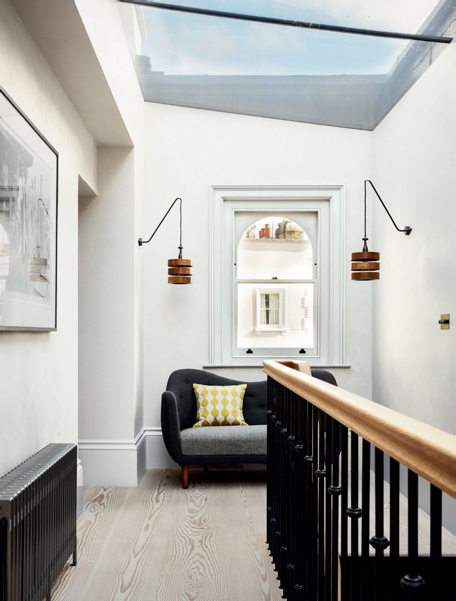 Image may contain Interior Design Indoors Banister Handrail Railing Floor Flooring Window Living Room and Room