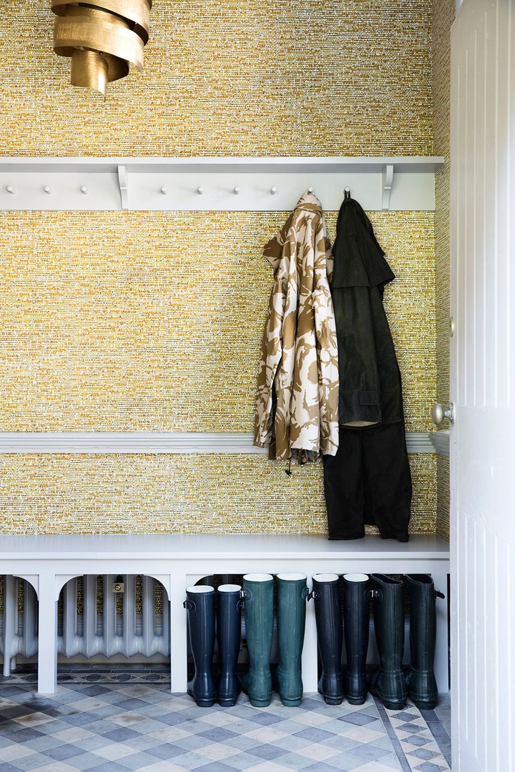 Image may contain Coat Rack Interior Design and Indoors