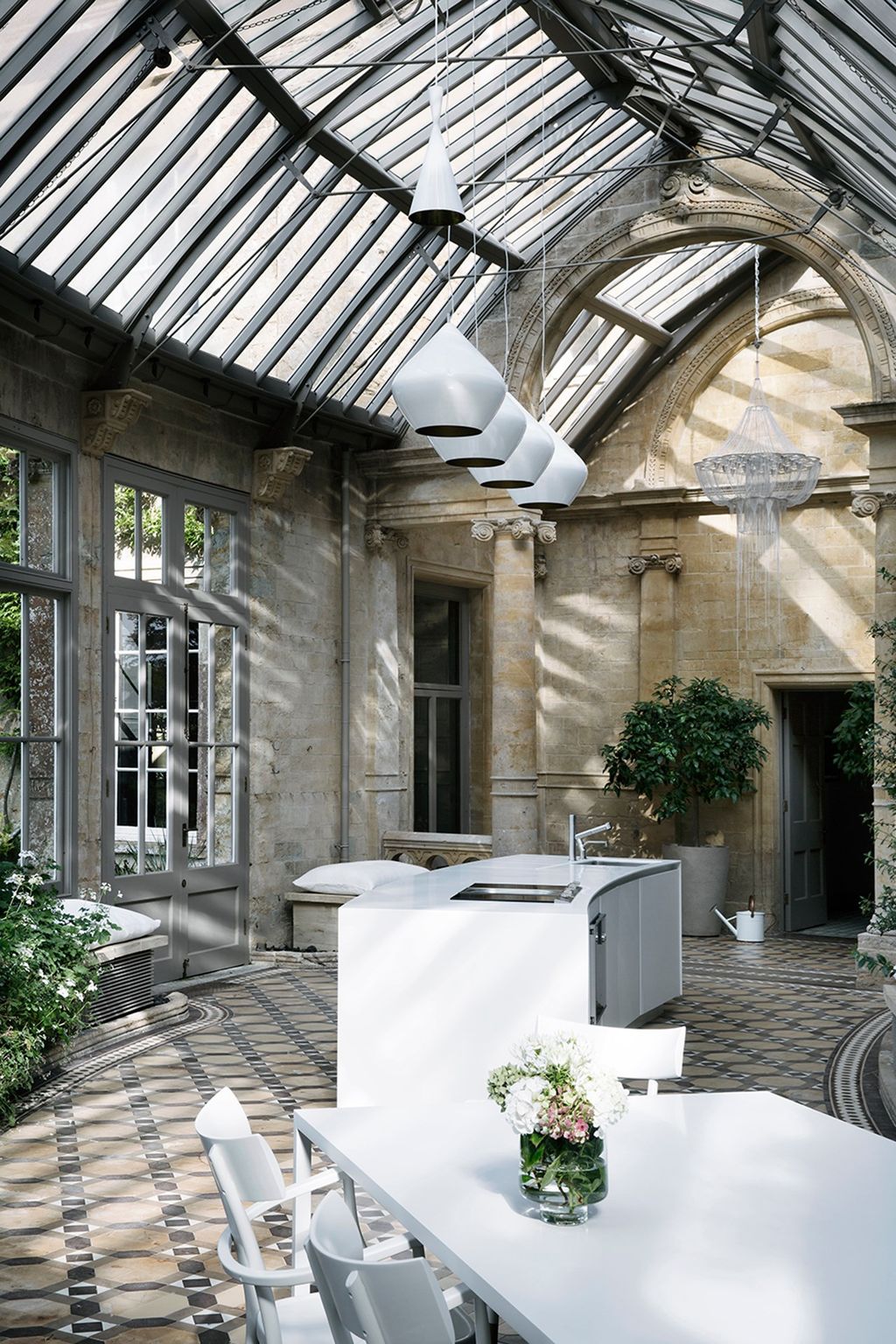 Image may contain Patio Furniture Chair Building Porch Architecture Flooring and Window