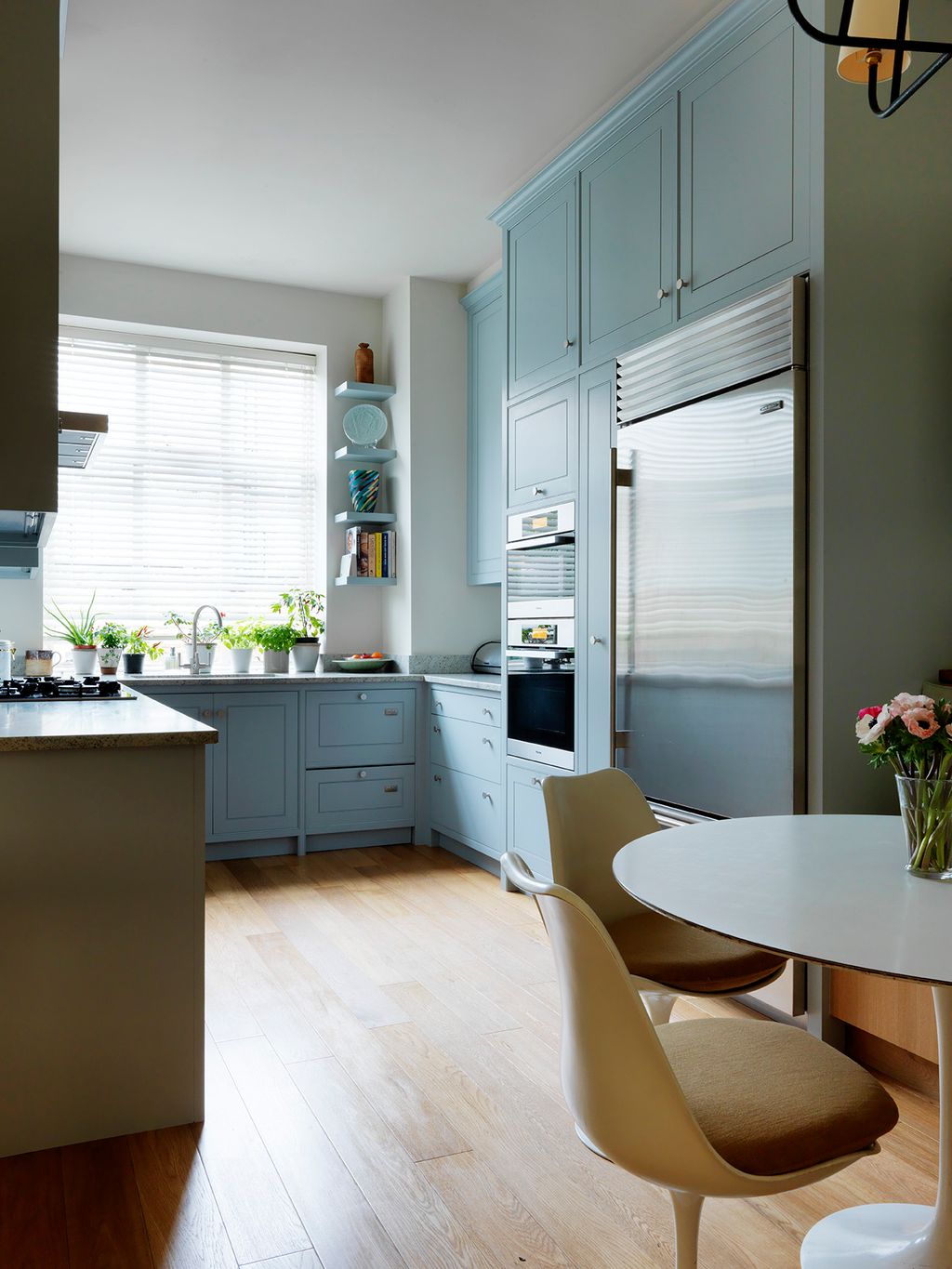 Image may contain Furniture Chair Room Indoors Interior Design Kitchen Flooring and Wood