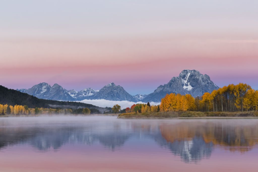 Image may contain Nature Water Outdoors Mountain Range Mountain Lake Ocean and Sea