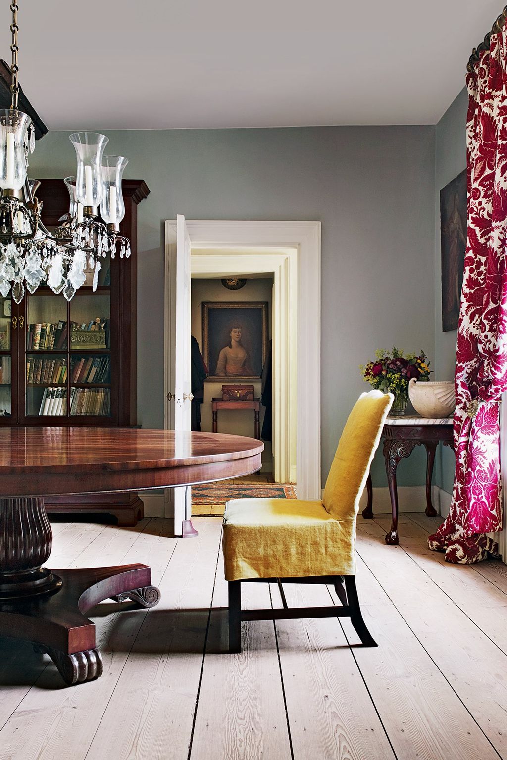 Image may contain Furniture Chair Table Room Indoors Living Room Dining Table Dining Room Lamp and Interior Design