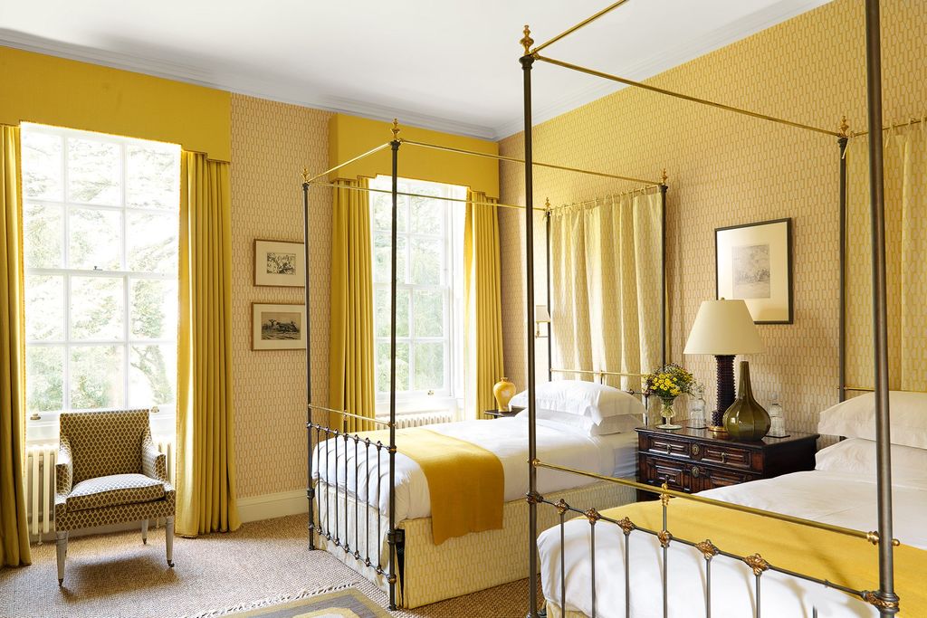 Image may contain Furniture Room Bedroom Indoors Interior Design Bed and Wood