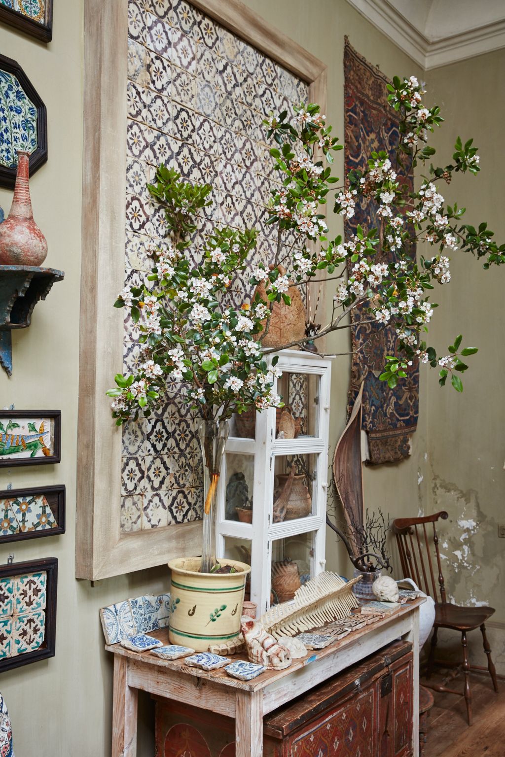 Image may contain Furniture Chair Interior Design Indoors Plant Shelf and Wall