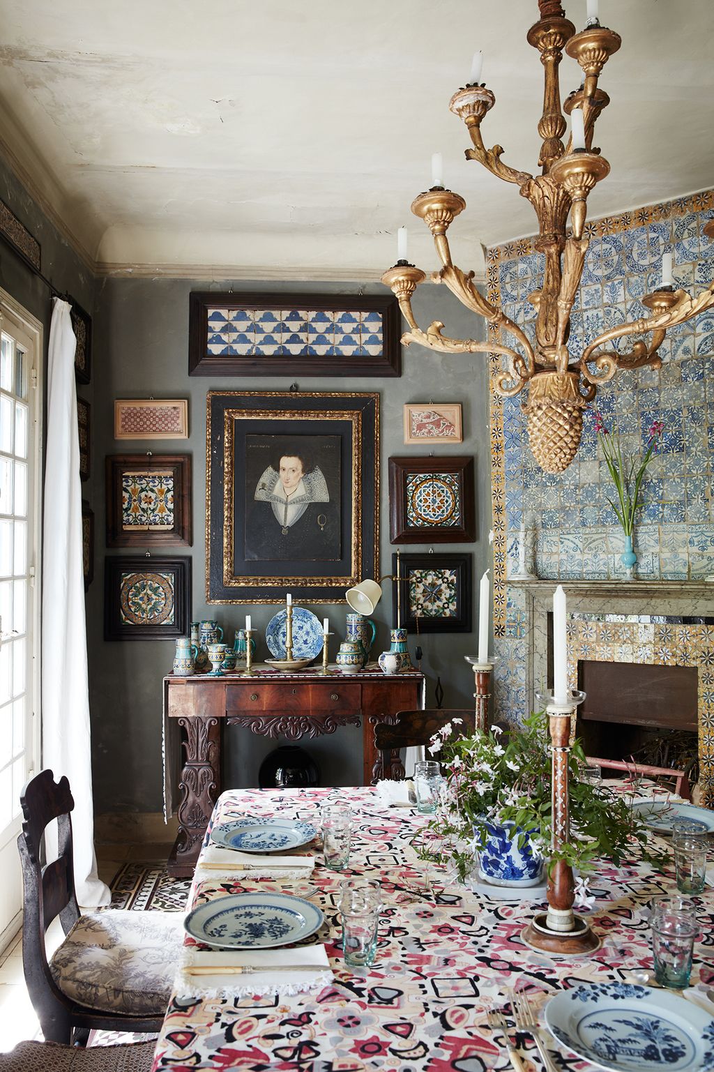 Image may contain Living Room Indoors Room Interior Design Home Decor Plant Furniture Flooring Flower and Blossom