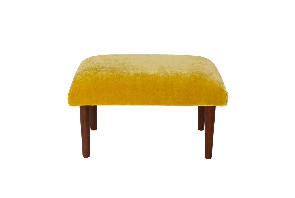 Image may contain Furniture and Ottoman