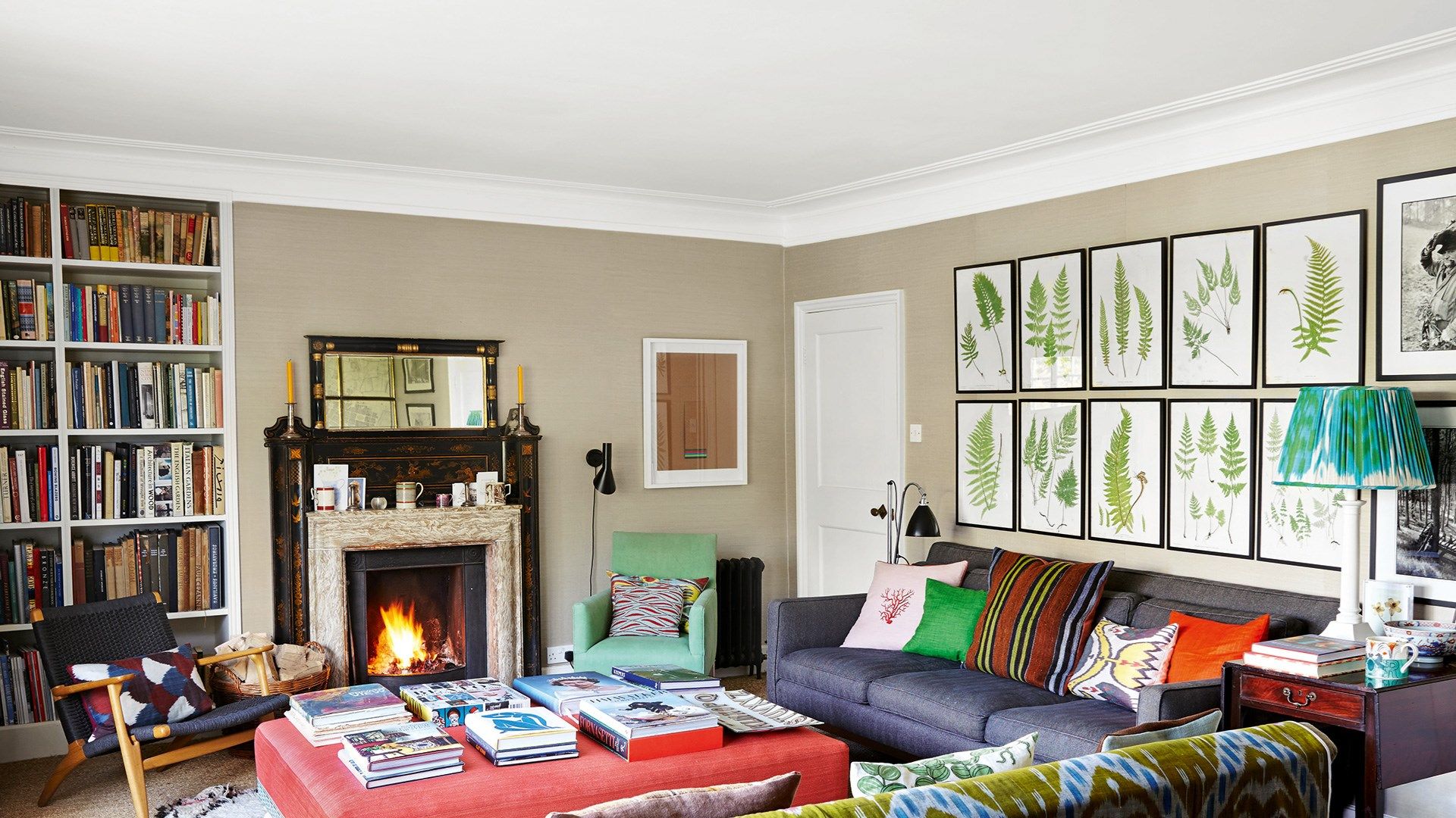 Living room design ideas. Image may contain Living Room Room Indoors Furniture Couch Interior Design Hearth Fireplace...