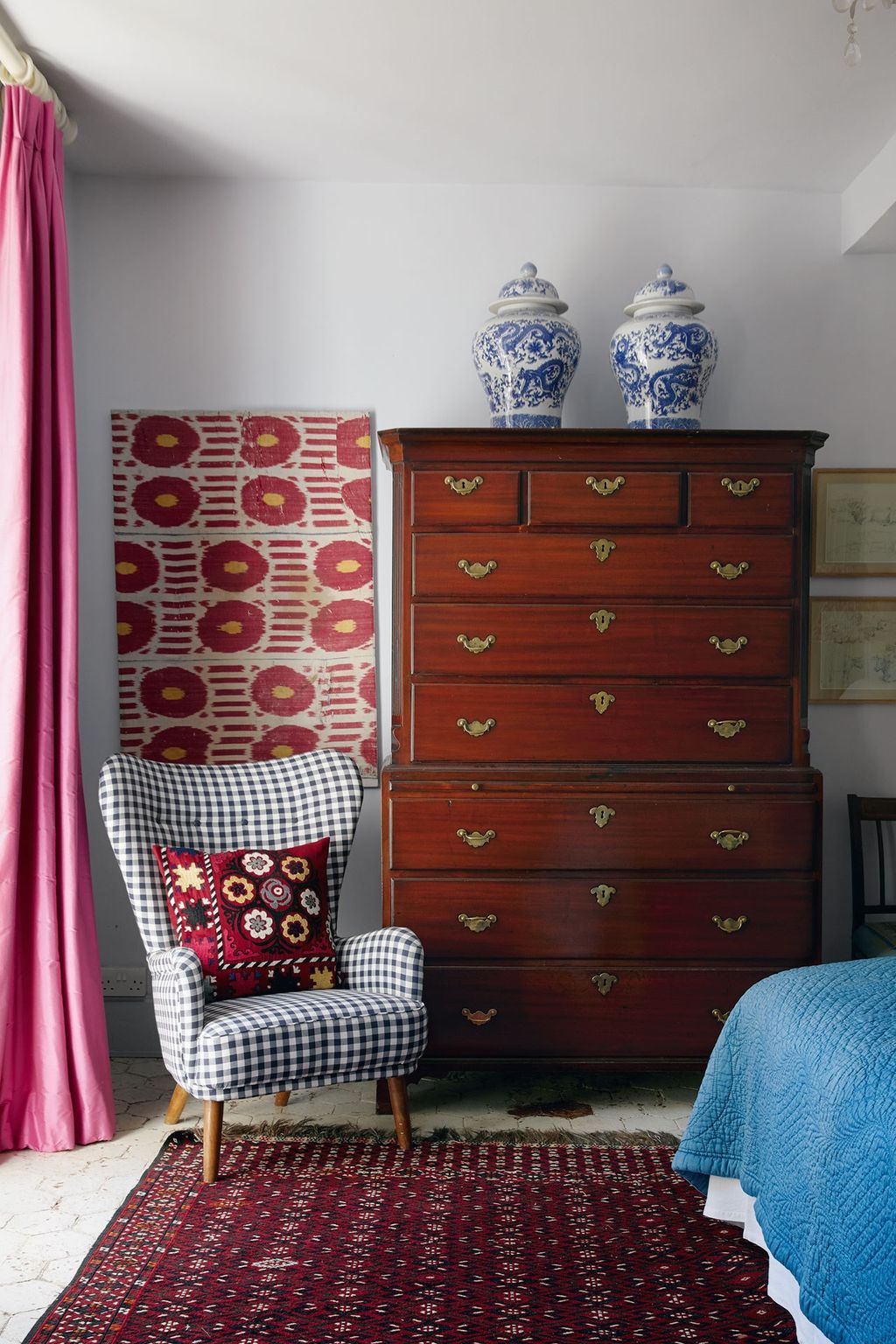 Image may contain Furniture Cabinet Rug Indoors Room Dresser and Chair