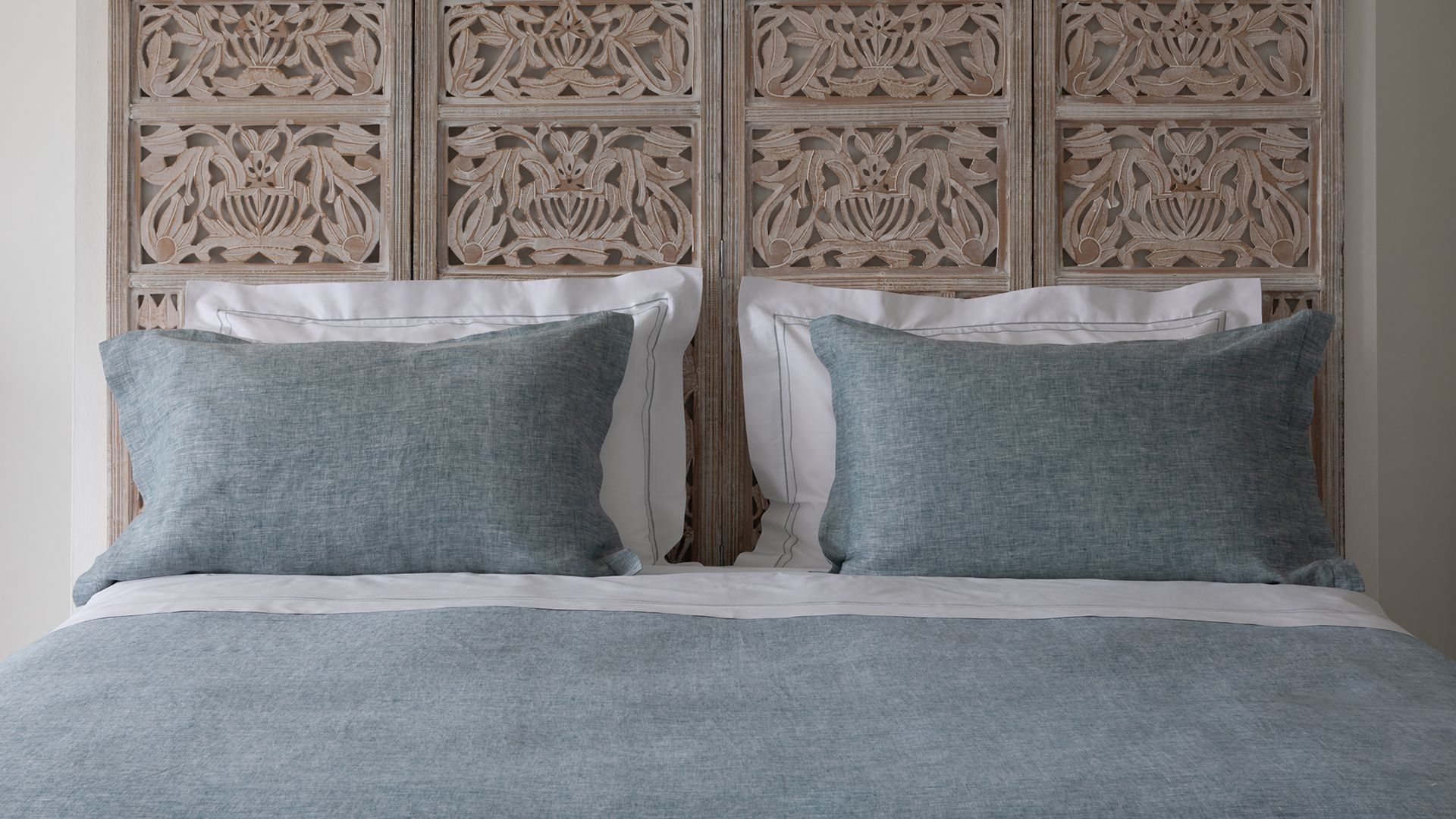 Image may contain Home Decor Cushion Pillow Linen Interior Design Indoors and Furniture