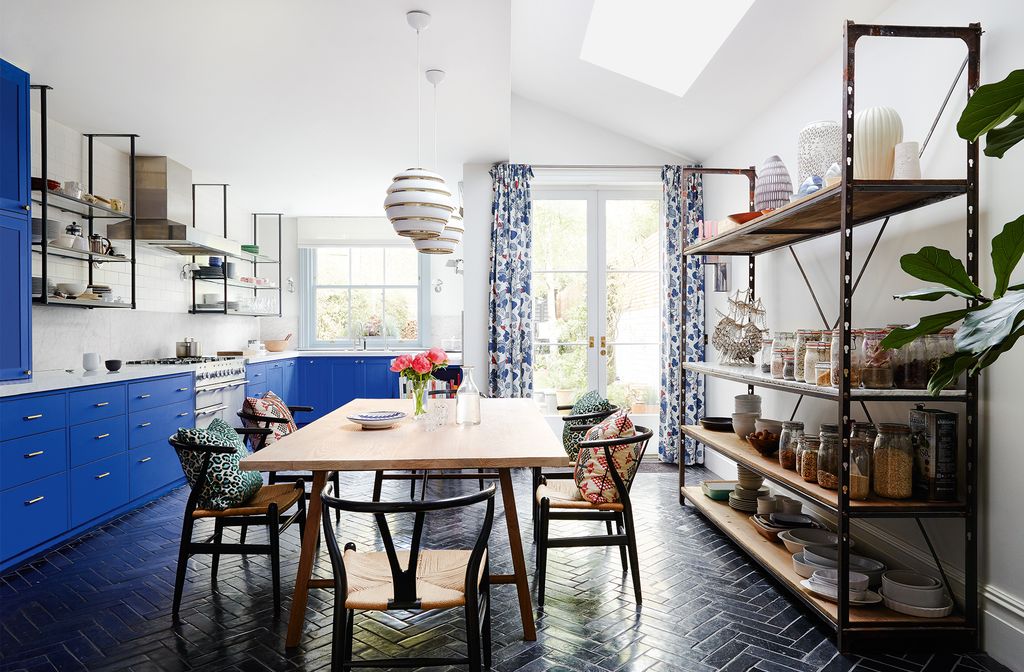 Image may contain Interior Design Indoors Flooring Furniture Chair Wood Room Floor Living Room and Dining Room