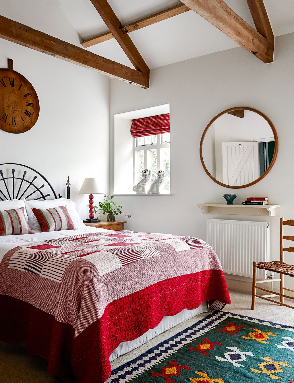 Image may contain Indoors Room Bedroom Furniture Home Decor Rug Interior Design and Bed