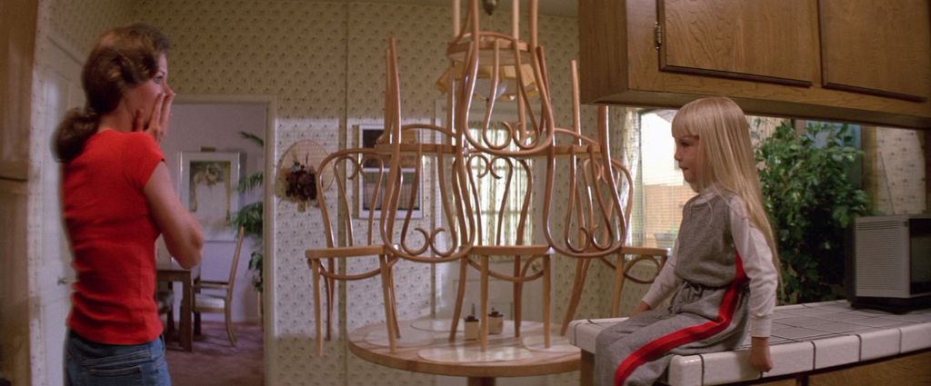 Image may contain Human Person Furniture Chair and Lamp