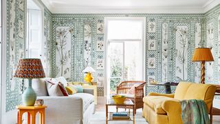 Image may contain Furniture Living Room Room Indoors Couch Table Interior Design and Coffee Table