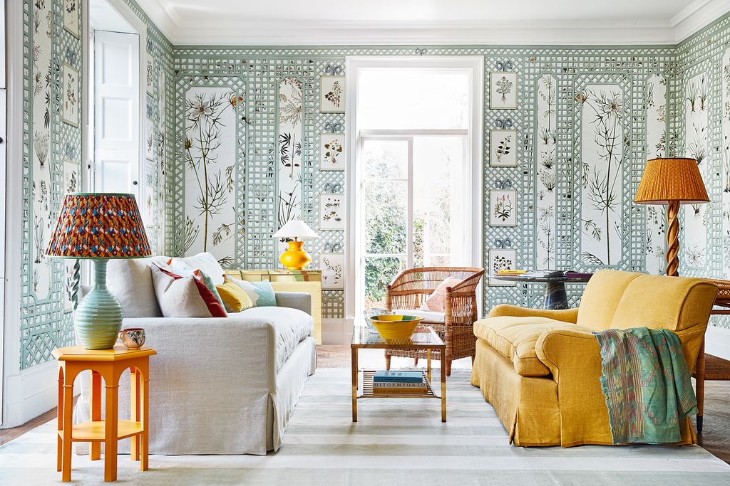 Image may contain Furniture Living Room Room Indoors Couch Table Interior Design and Coffee Table