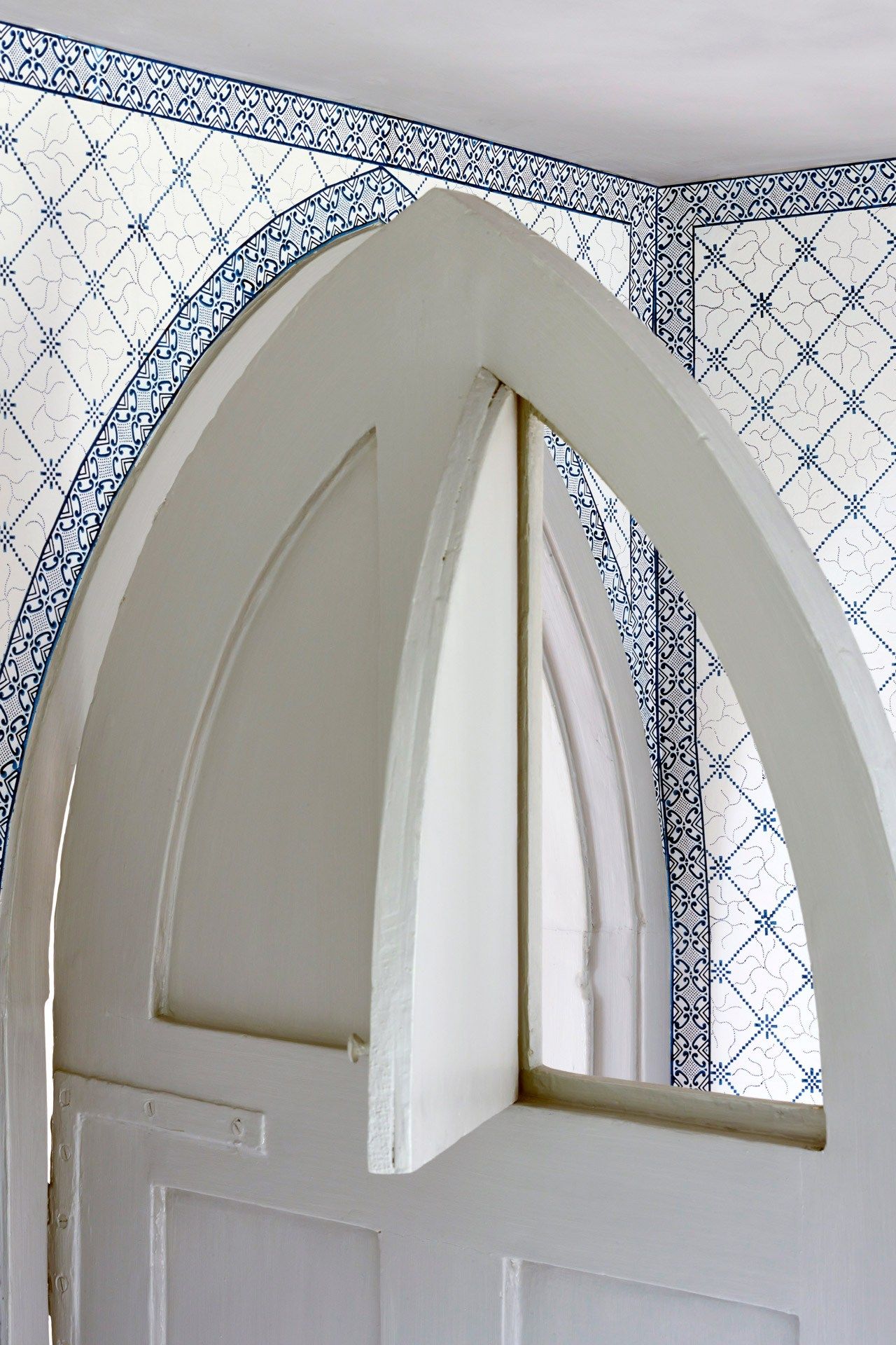 Image may contain Banister Handrail Building Architecture Arched Arch Dome and Window