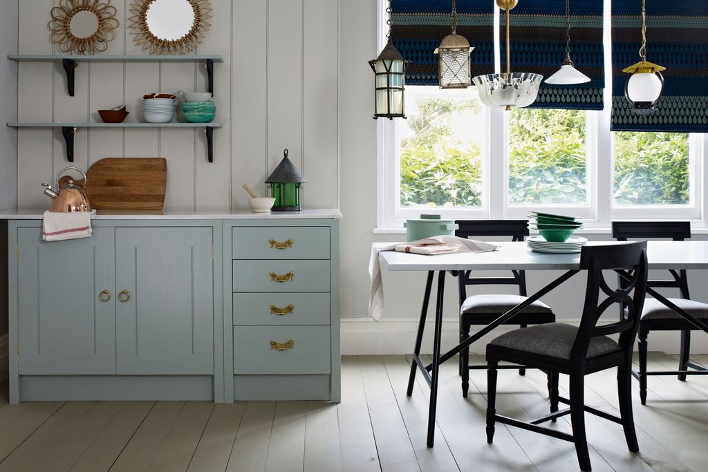 Image may contain Furniture Chair Indoors Room Interior Design Table and Living Room