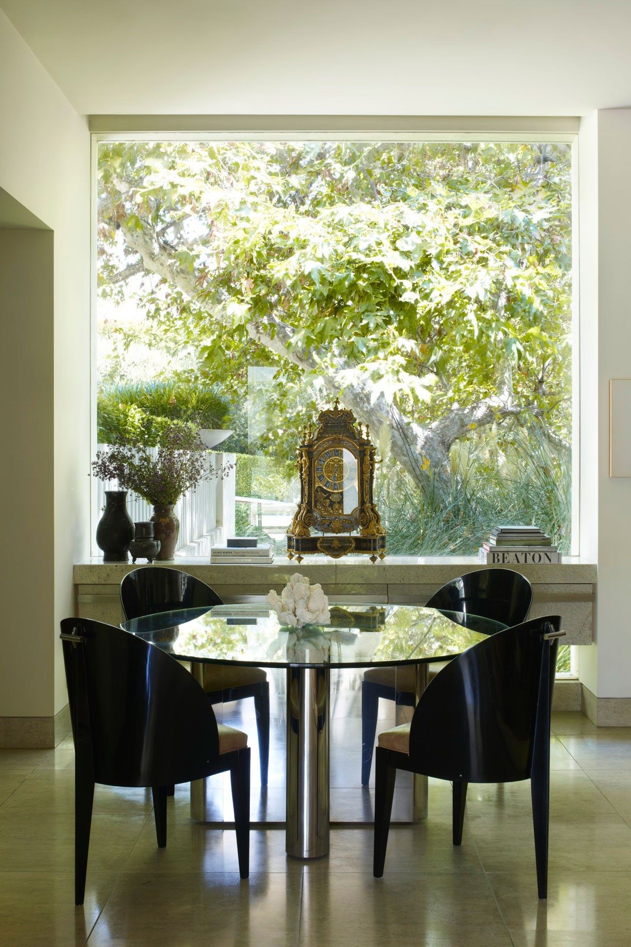 Image may contain Furniture Chair Dining Table Table Room Indoors Dining Room Interior Design Flooring and Wood