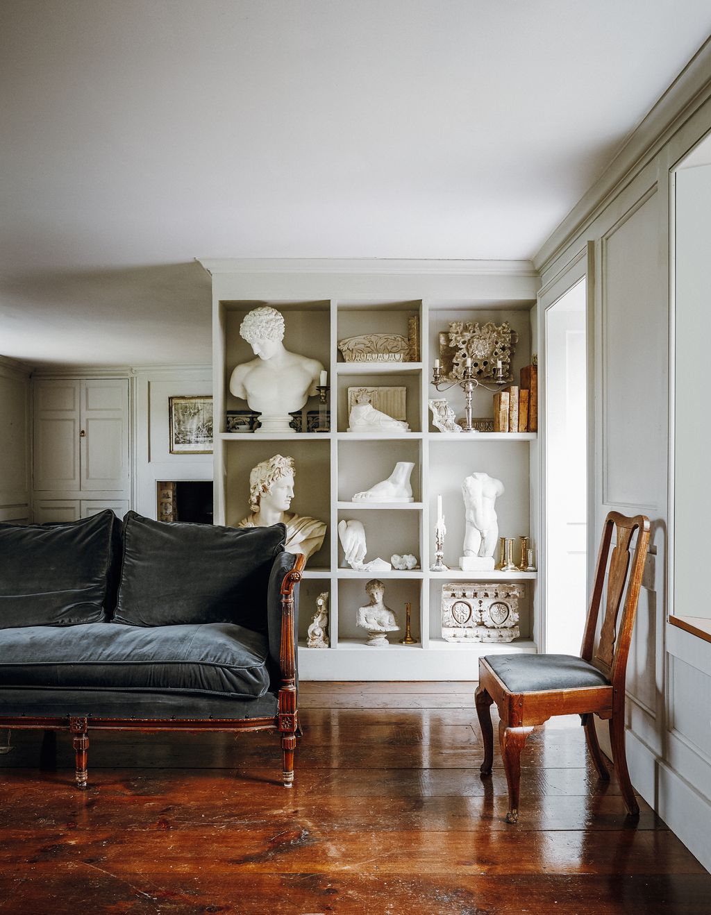 The sofa which is a copy of an 1820s American design was bought on Ebay.