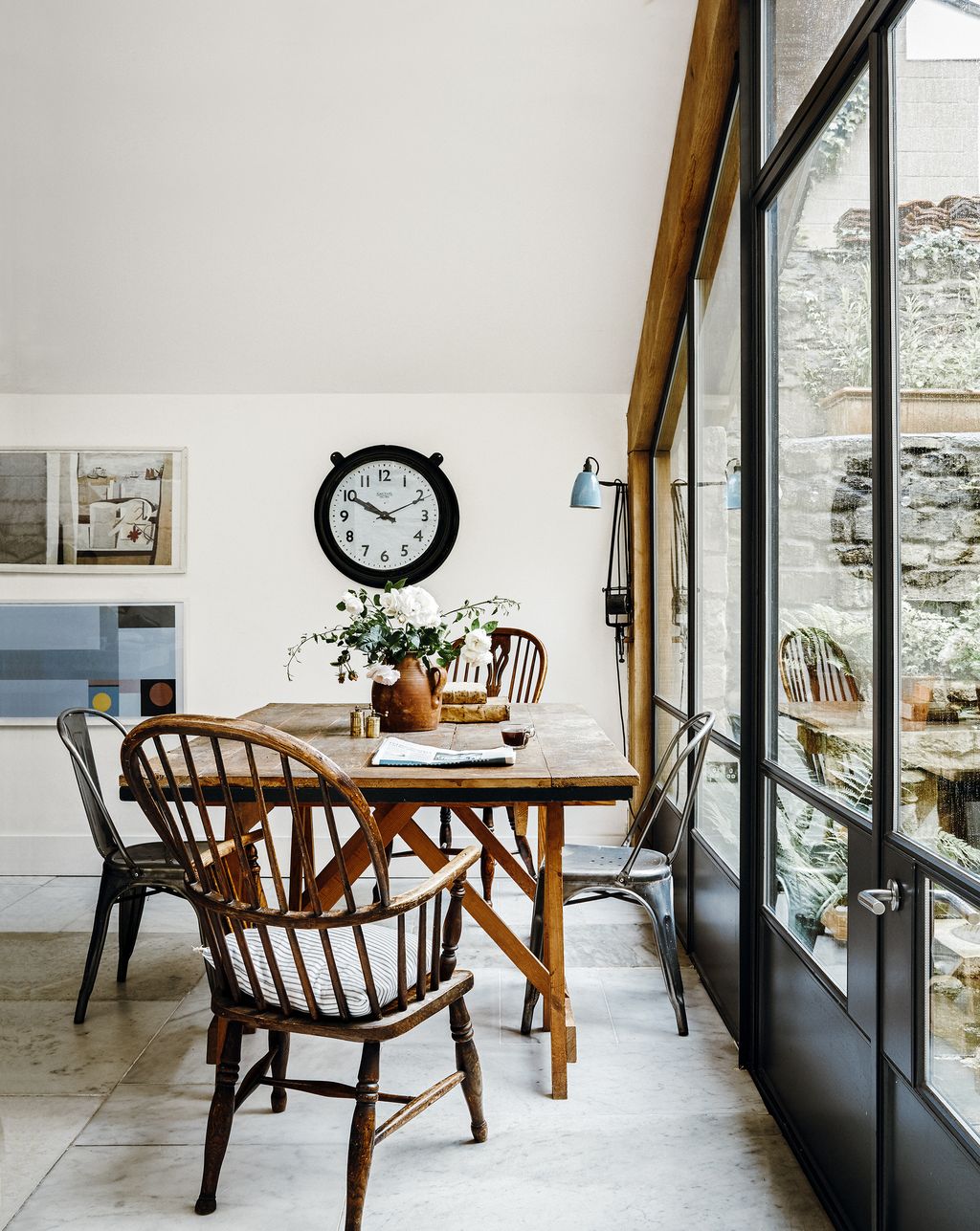 Image may contain Furniture Chair Wood Indoors Interior Design Flooring Floor Architecture Clock Tower and Tower