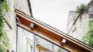 Image may contain Furniture Chair Patio Vase Plant Pottery Potted Plant and Jar