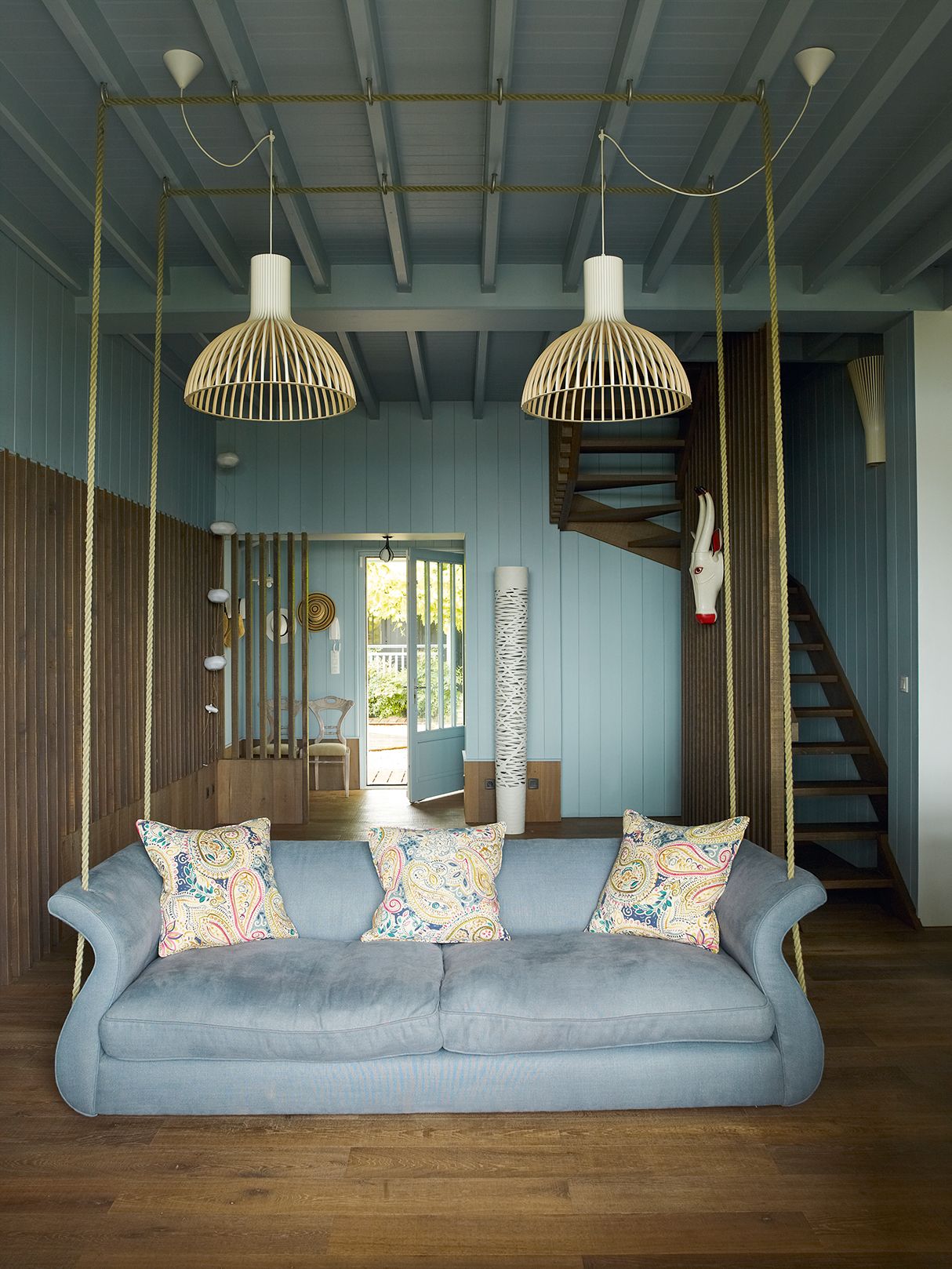 Image may contain Living Room Indoors Room Couch and Furniture