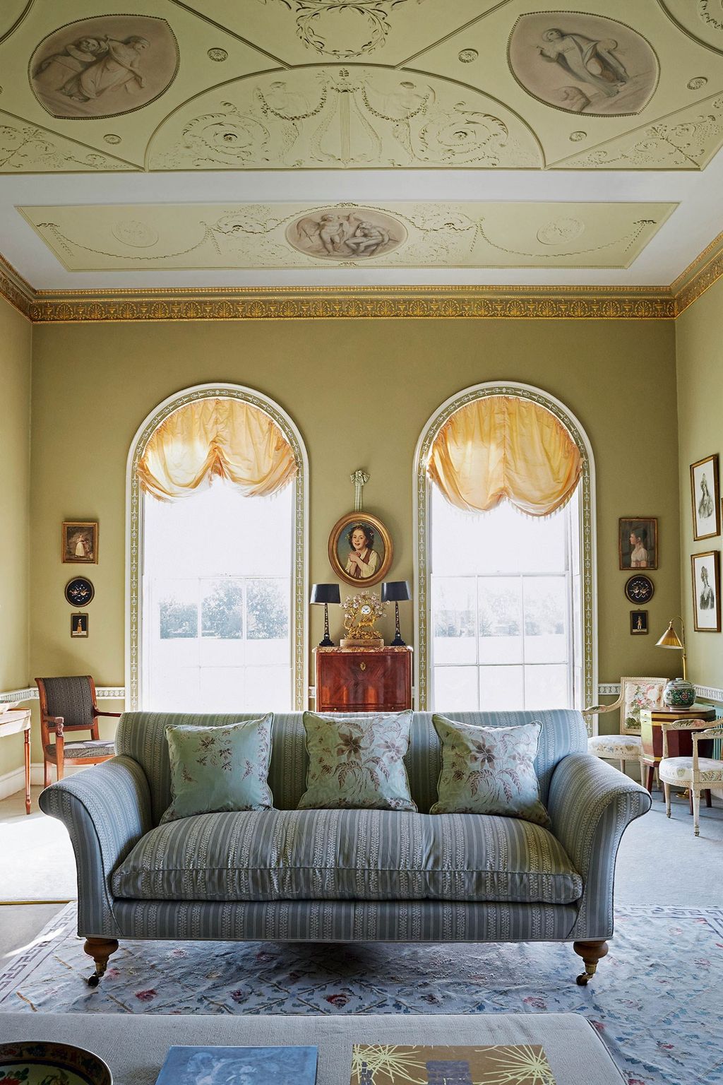 Image may contain Couch Furniture Living Room Indoors Room Home Decor and Rug