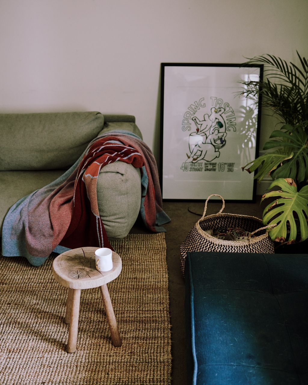 Image may contain Furniture Home Decor Living Room Indoors Room Couch and Table