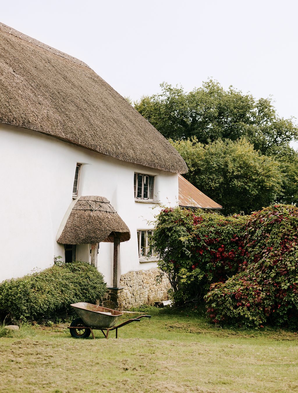 Image may contain Outdoors Nature Building Garden Countryside Housing Transportation and Vehicle