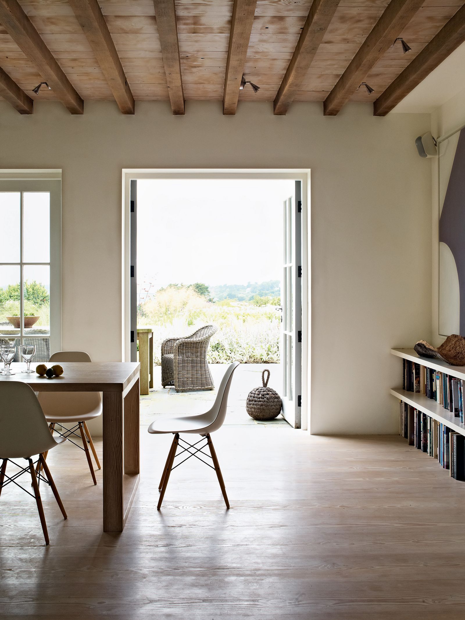 Image may contain Furniture Chair Wood Table Flooring Dining Table Interior Design Indoors Floor and Hardwood