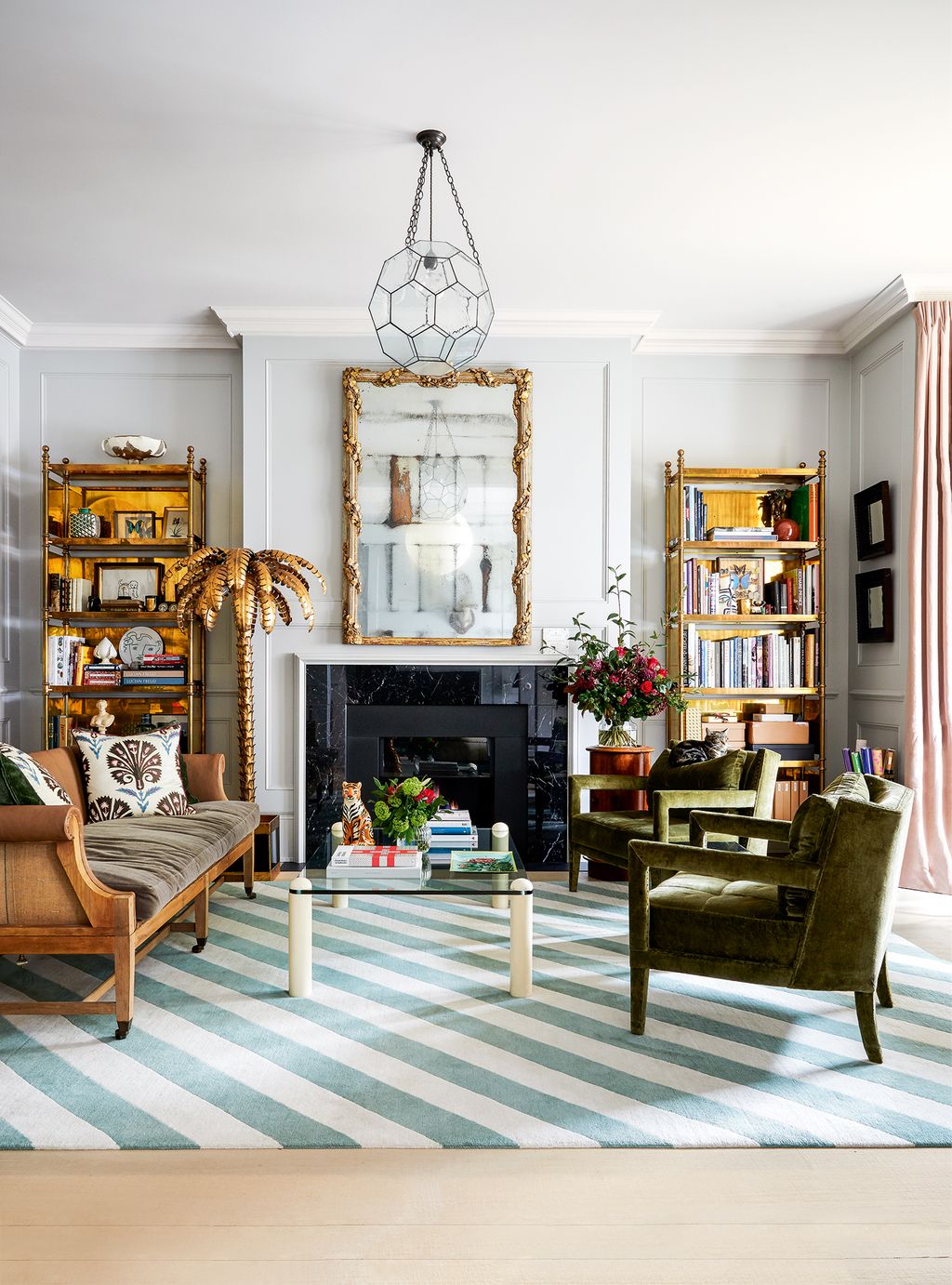 Image may contain Furniture Living Room Room Indoors Interior Design Table Rug Lobby and Couch