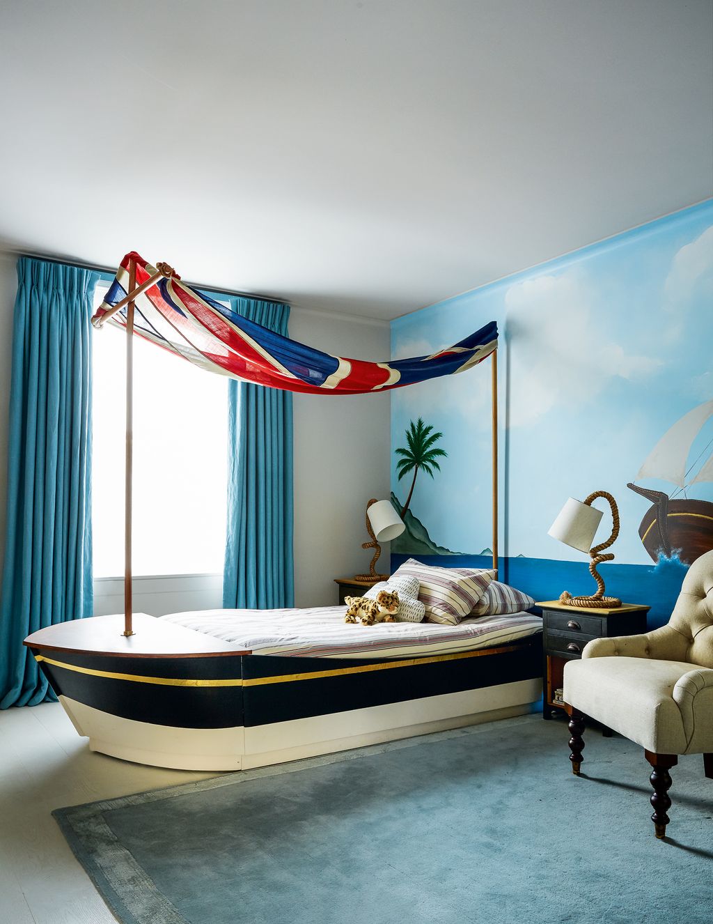 Image may contain Furniture Room Bedroom Indoors Interior Design Flag Symbol Living Room Housing and Building