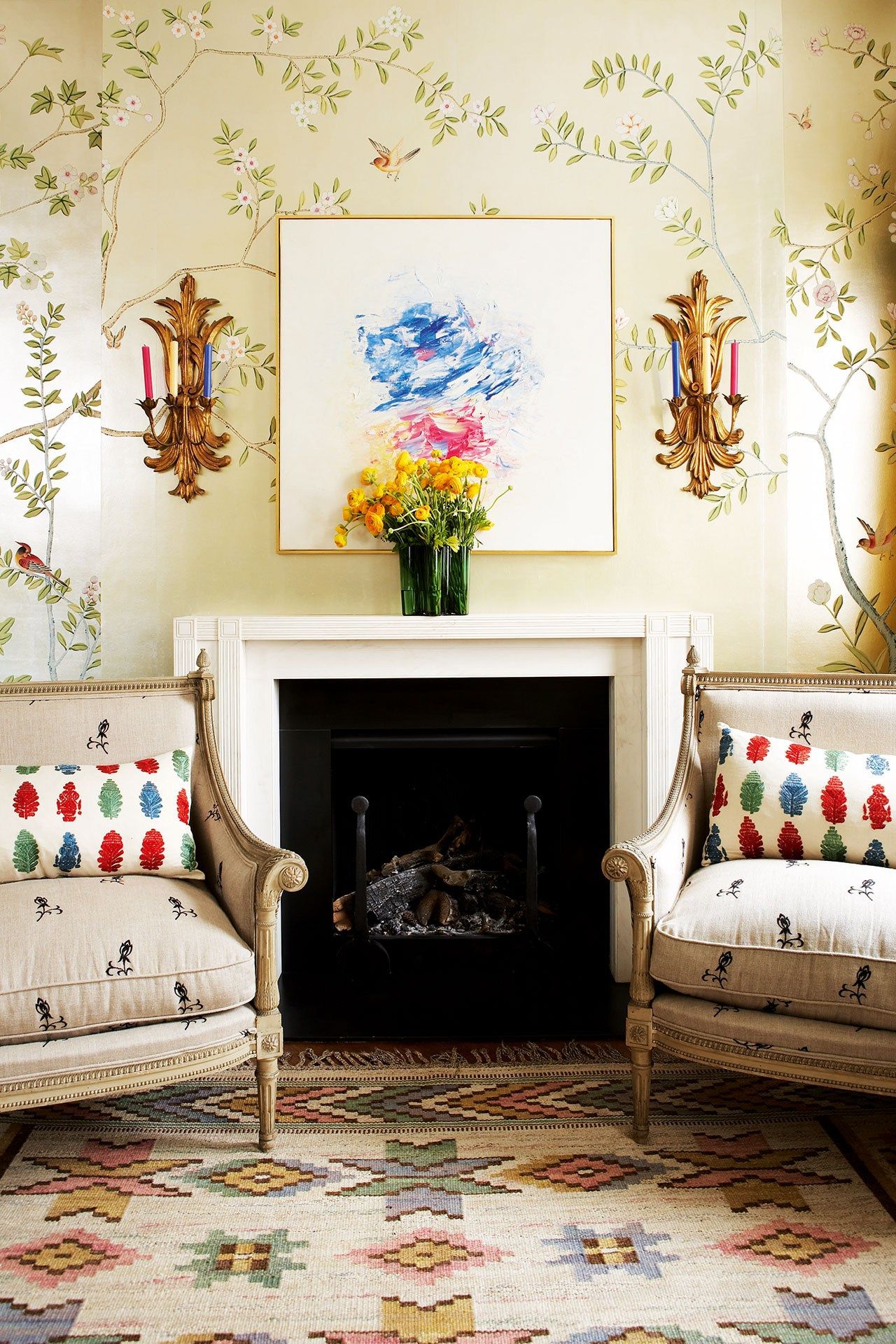 Image may contain Home Decor Indoors Furniture Fireplace Rug Room Hearth Living Room Cushion Pillow and Couch