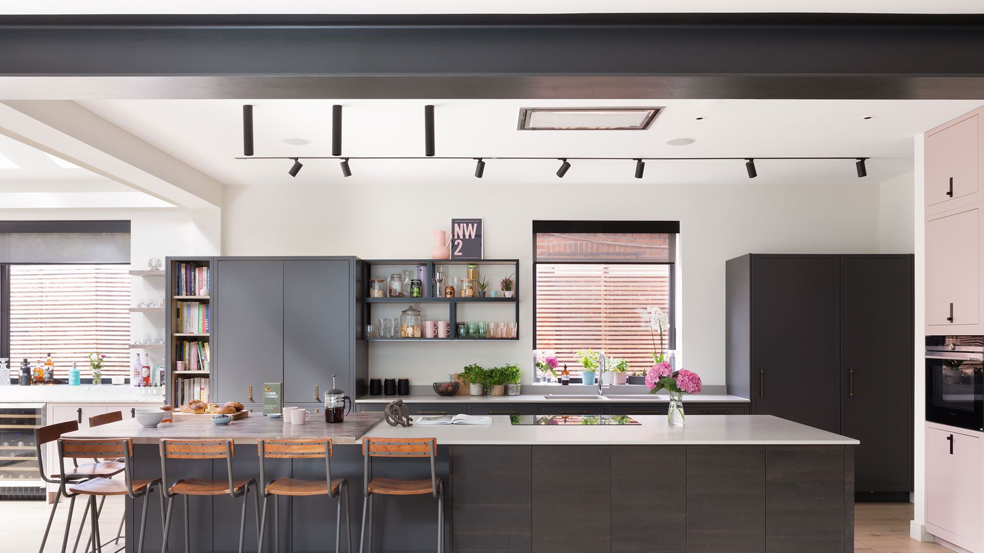 Image may contain Indoors Room Furniture Chair Interior Design Kitchen Island and Kitchen