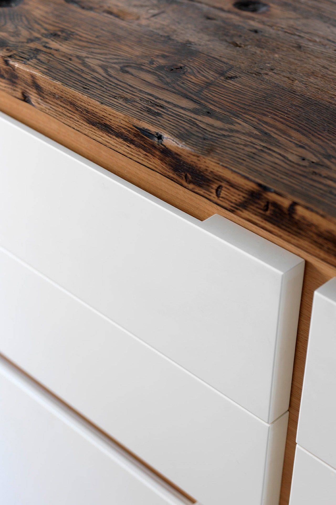 Image may contain Wood Hardwood Furniture and Drawer