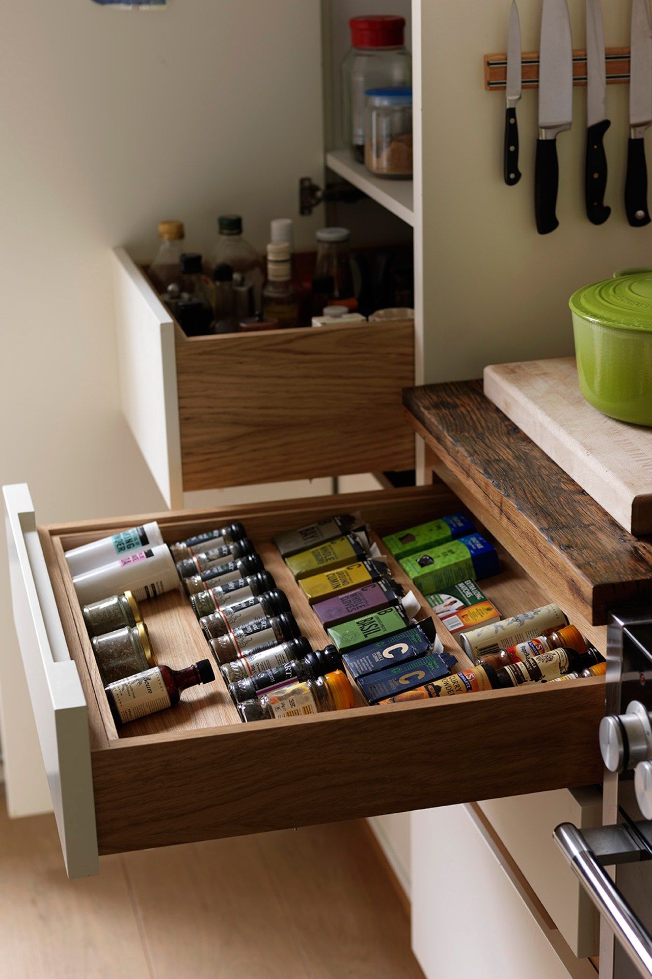 Image may contain Furniture Drawer Shelf Blade Weapon Knife Weaponry and Cabinet