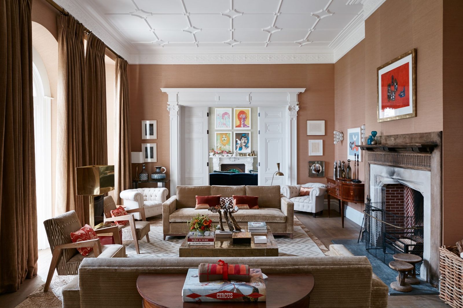 Image may contain Living Room Indoors Room Furniture Interior Design Couch Table and Fireplace