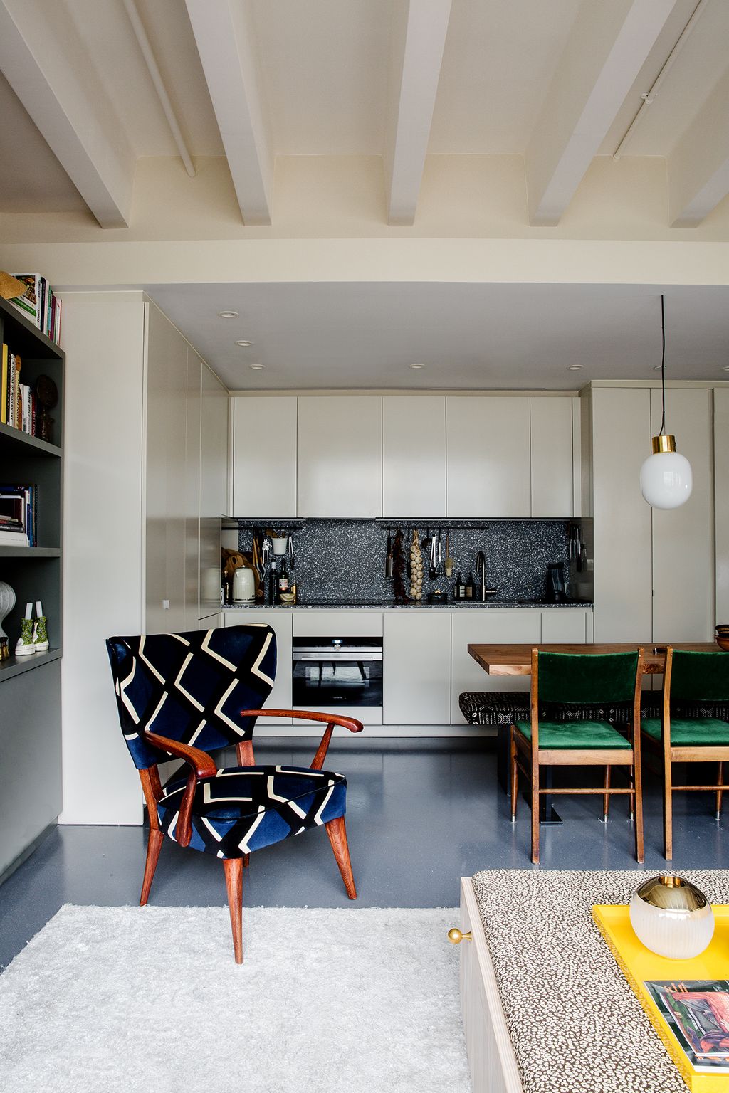 Image may contain Furniture Chair Interior Design Indoors Room Shelf and Living Room