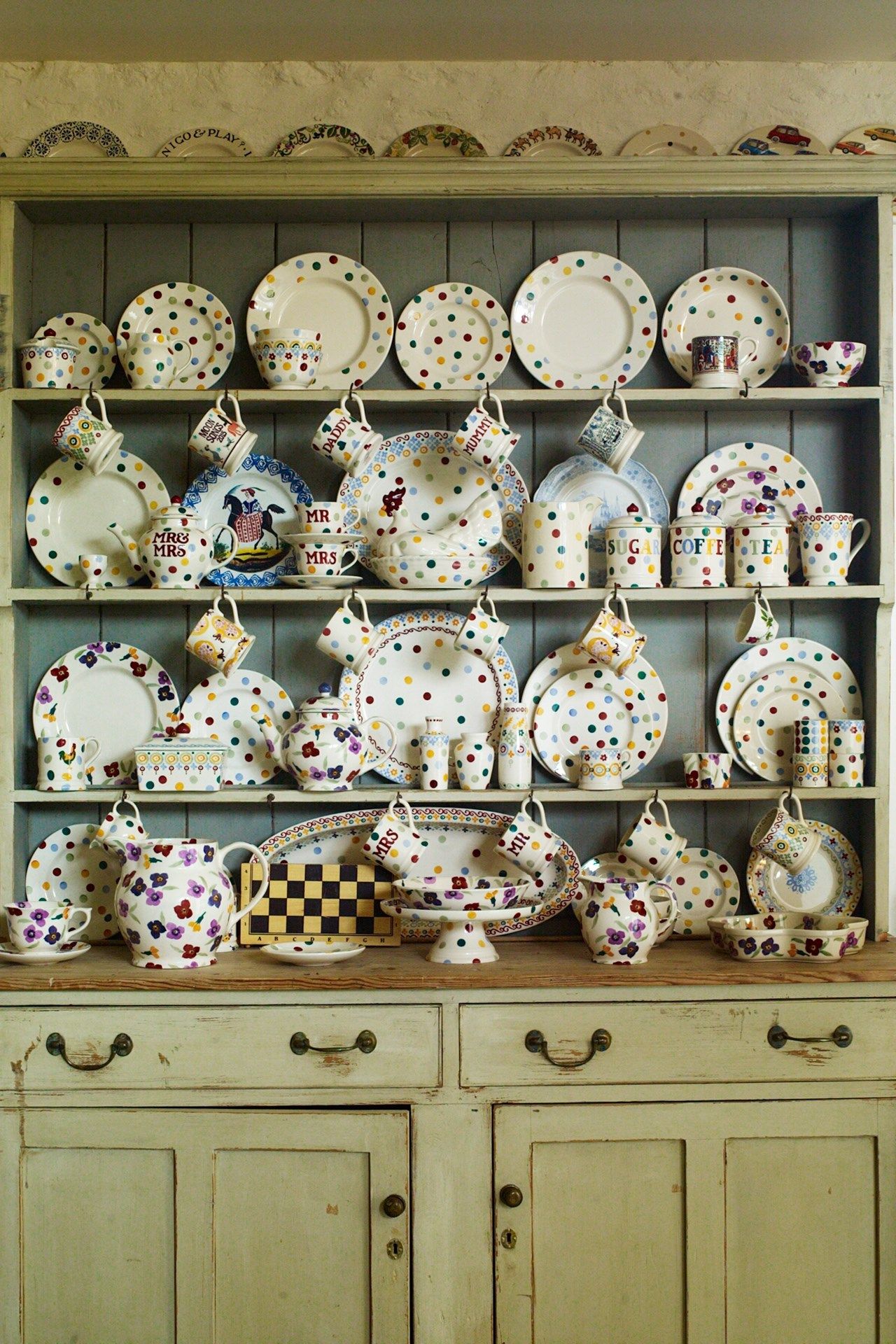 Image may contain Porcelain Art Pottery Clock Tower Architecture Tower Building Furniture Food Dish and Meal