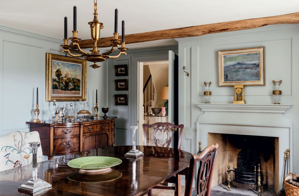 Image may contain Fireplace Indoors Room Dining Room Furniture and Living Room